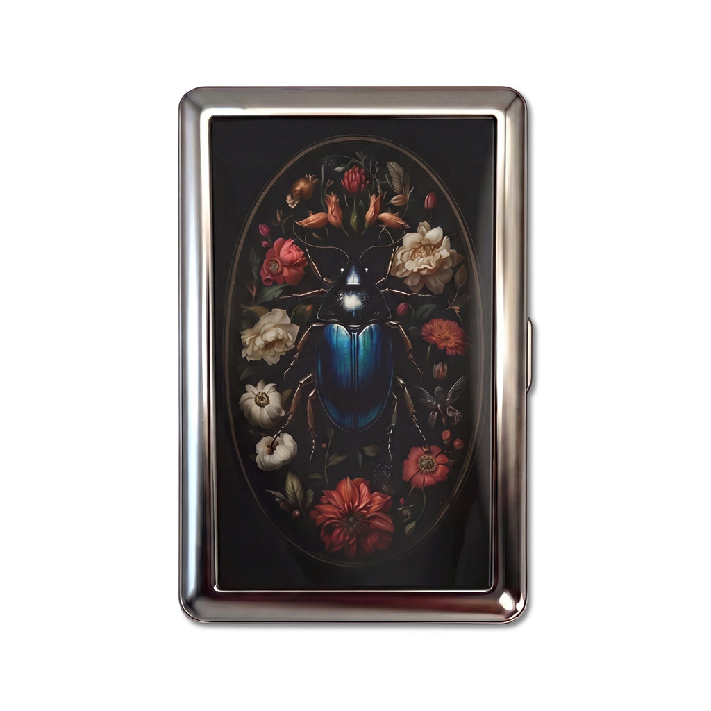 Gothic Beetle tin cardholder wallet with iridescent blue beetle framed by dark flowers