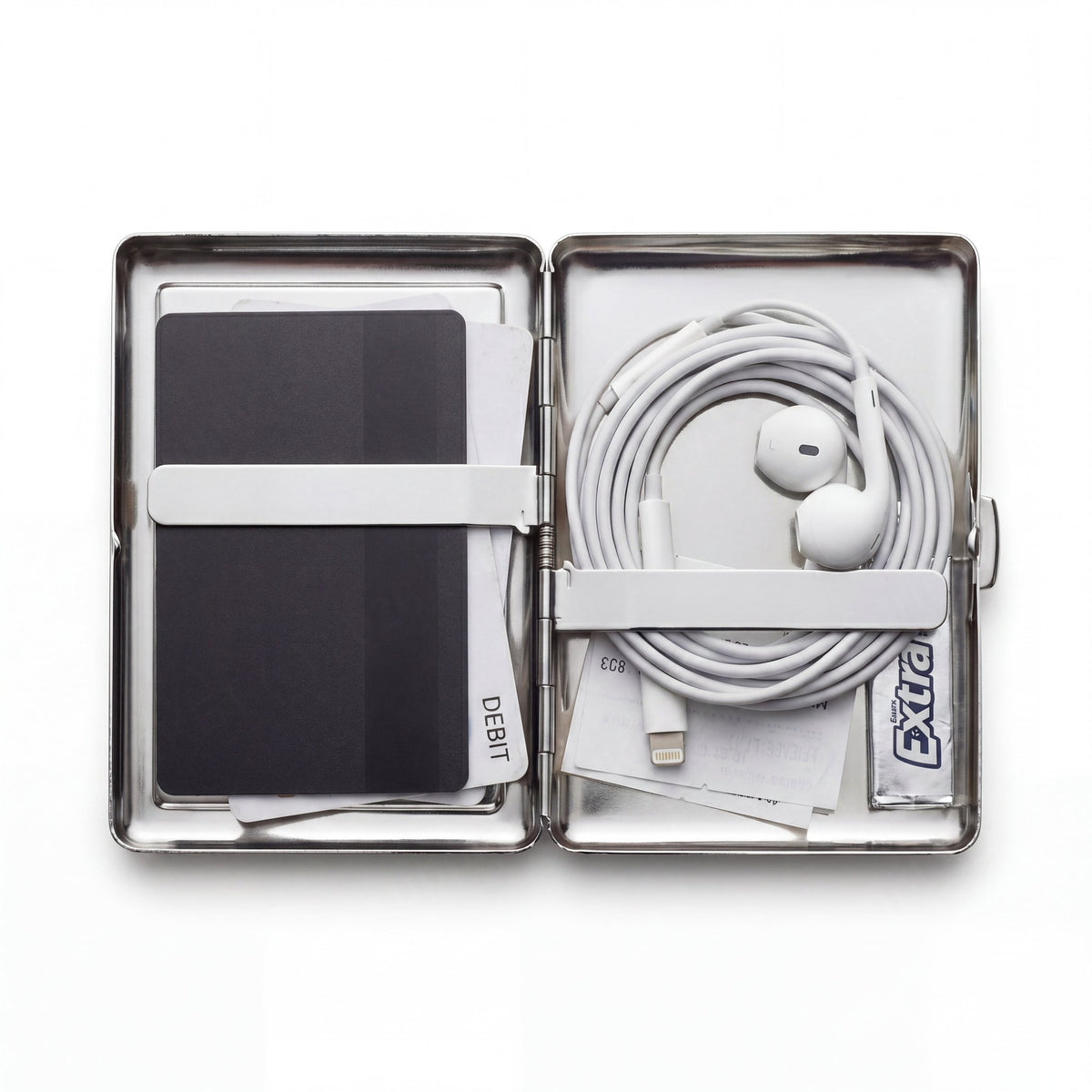 Trinket tin cardholder wallet open showing minimal everyday carry contents