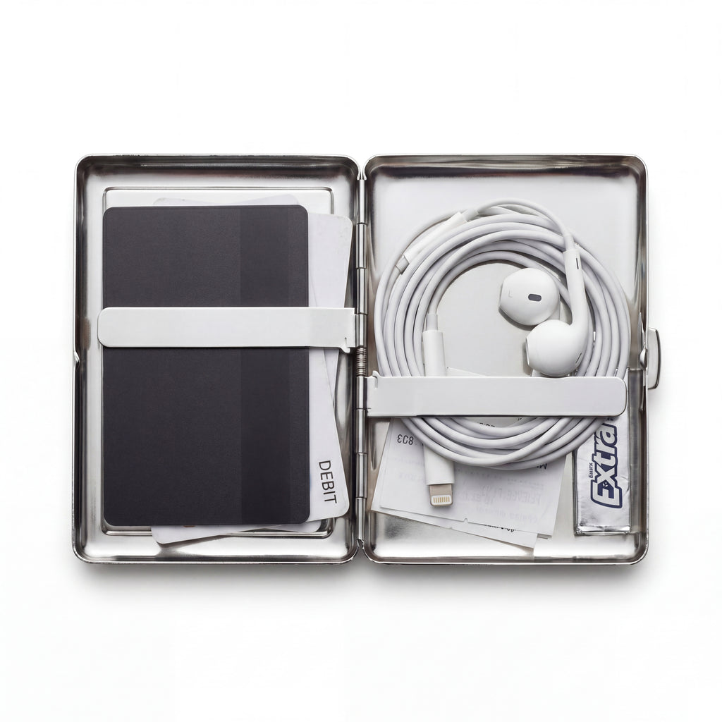Trinket tin cardholder wallet open showing minimal everyday carry contents