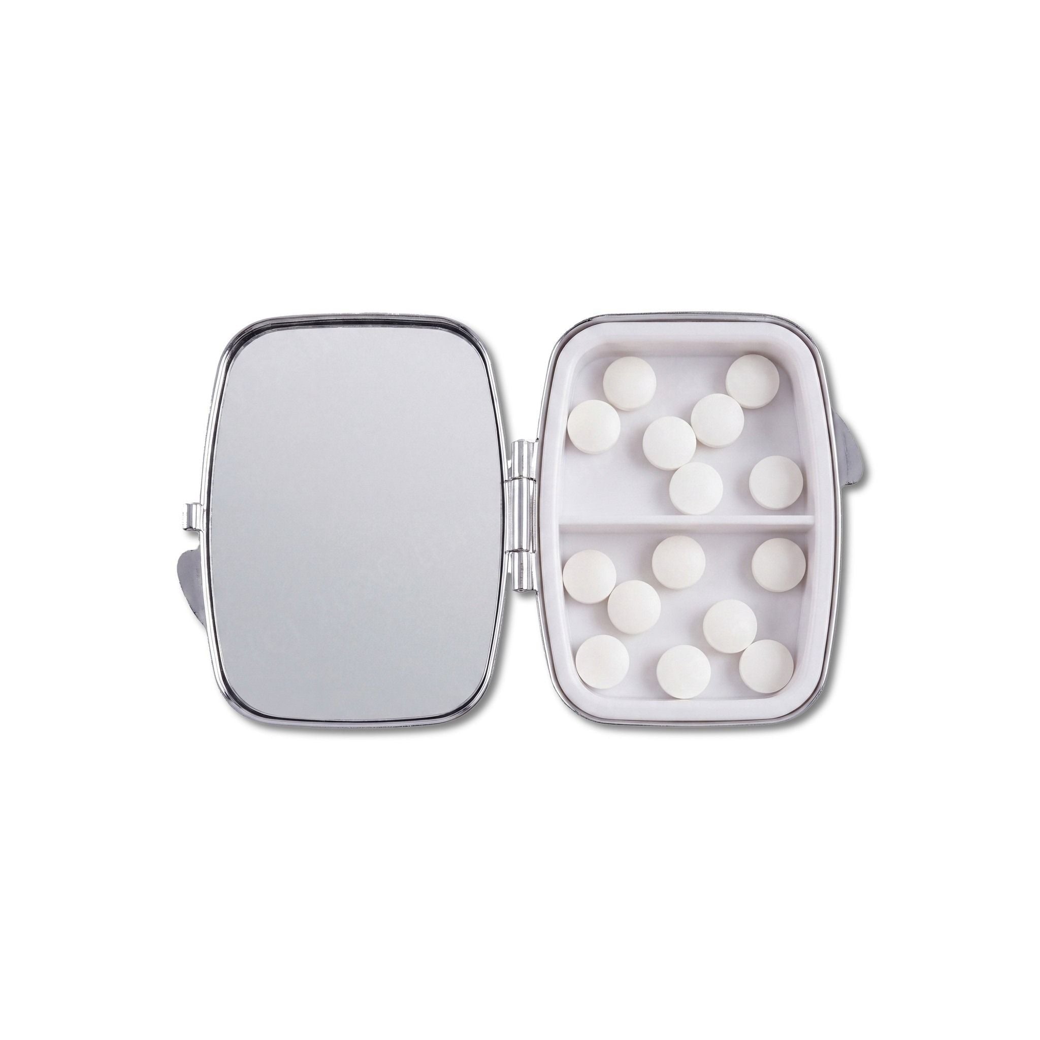 Trinket pill box open showing the mirrored lid and two compartments of tablets