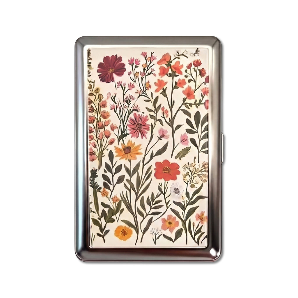 Wildflower Press tin cardholder wallet with pressed botanical flowers on cream background
